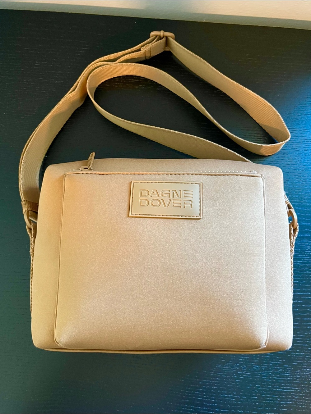 Dagne Dover Micah Neoprene Crossbody Bag in Camel (a rich golden brown)